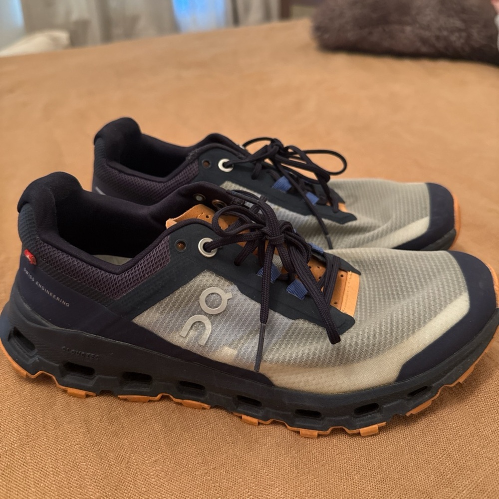 On Running Women’s Navy and Orange Shoes